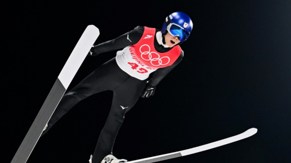 Japan's Kobayashi holds nerve to win Olympic ski jumping gold