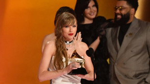 Taylor Swift wins Album of the Year Grammy, breaking record