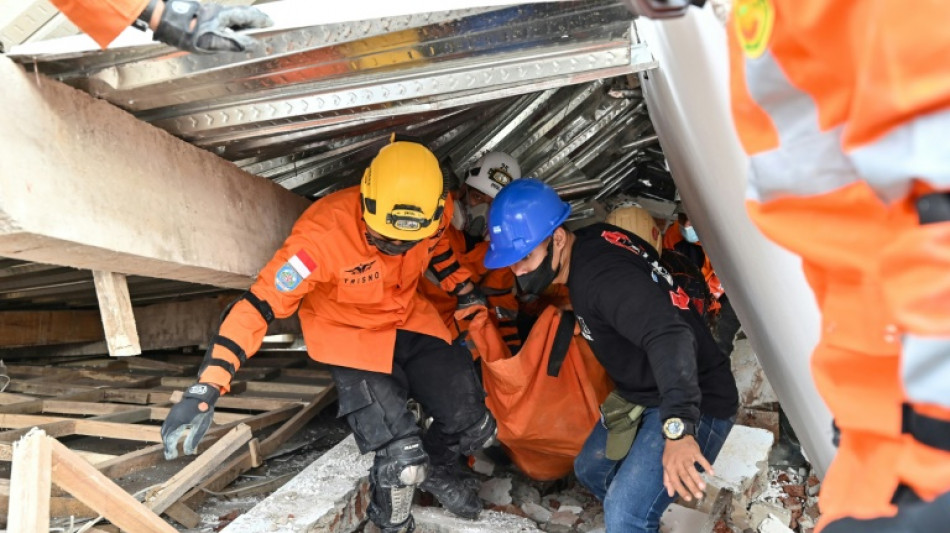 Indonesia boy, 6, rescued from quake rubble after two days