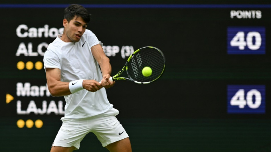 Alcaraz up and running on 'beautiful' Wimbledon Centre Court