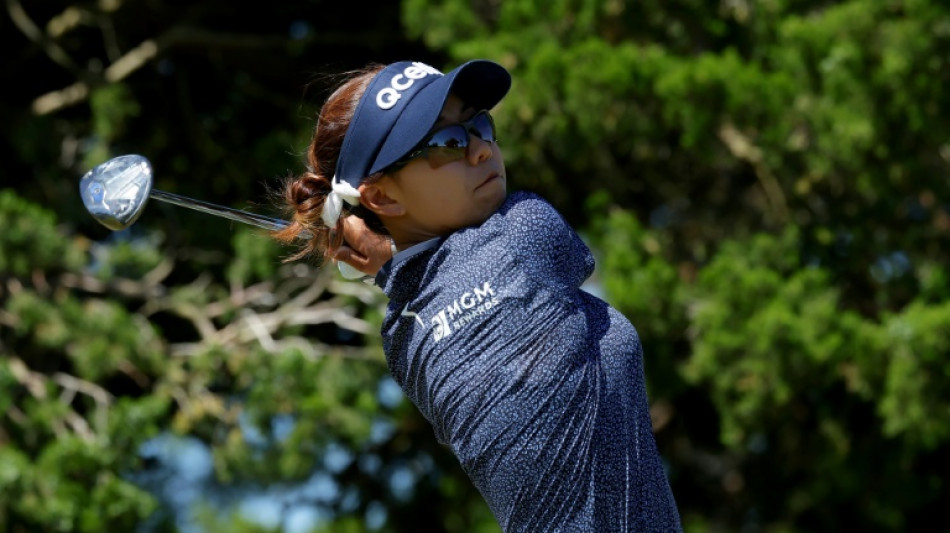 Shin masters tough conditions to claim LPGA lead