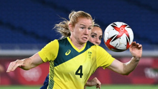 Australia's most capped footballer Polkinghorne to retire