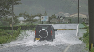 Weakening typhoon churns through Japan, up to six dead