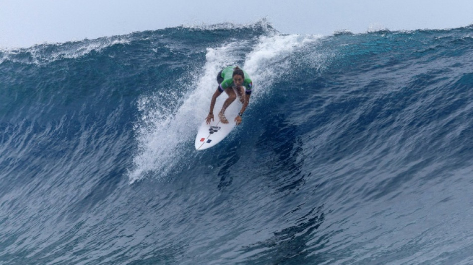 Olympic surfers deal with towering Teahupo'o