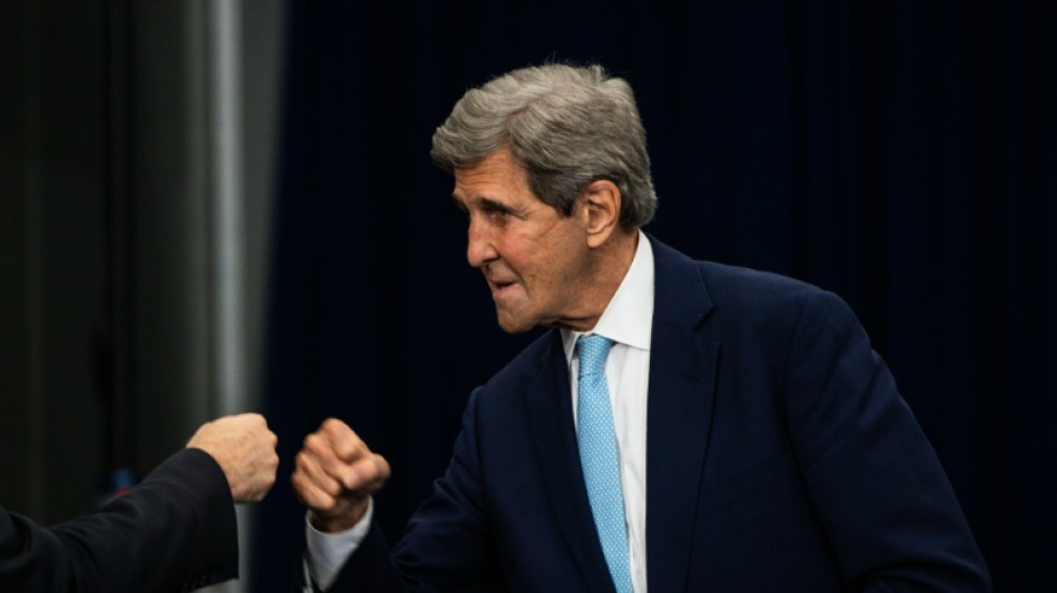 Kerry vows US to meet climate goal despite court setback