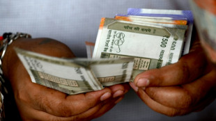 Indian rupee breaches 80 per dollar, hits new record low