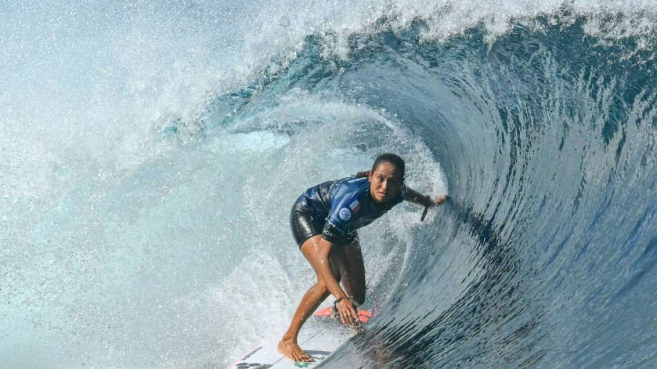 French Olympic surfer Fierro rides the waves to victory in Tahiti