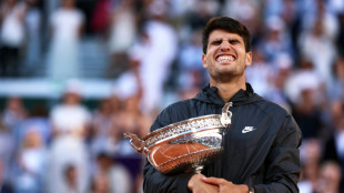 French Open champion Alcaraz eager to take clay form into grass season