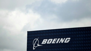 Troubled Boeing faces investors and awaits strike vote