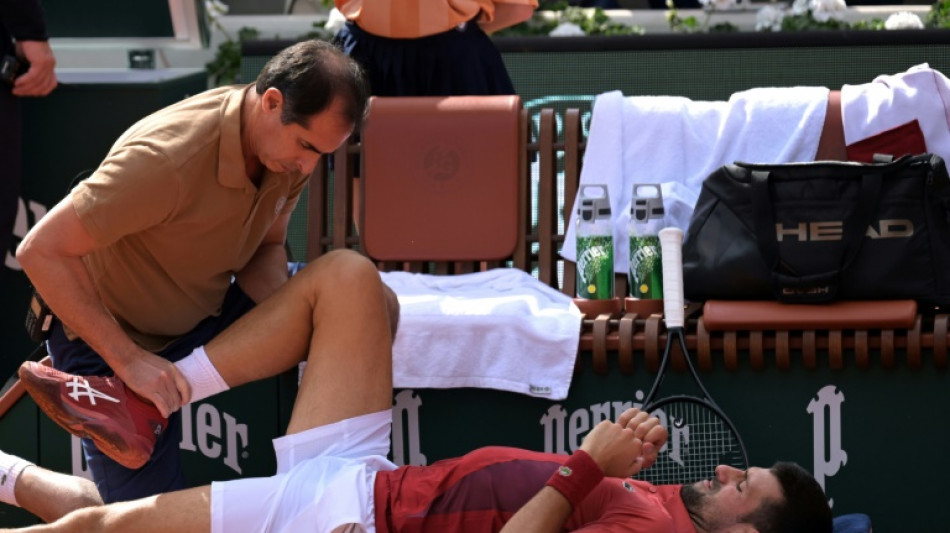 'Really sad' Djokovic out of French Open with knee injury