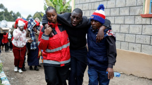 Anguished parents wait for news after Kenya school fire kills 17