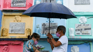 Filipinos flock to cemeteries for All Saints' Day