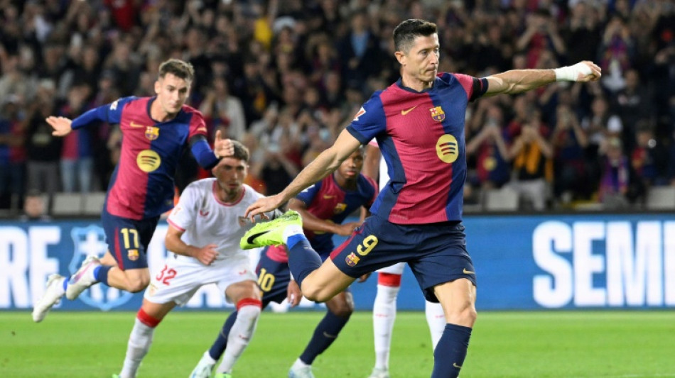 Lethal Lewandowski helps Barca rout Sevilla, Atletico triumph