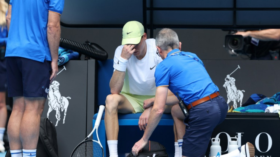 Sinner beats heat and broken net to make Australian Open quarters 