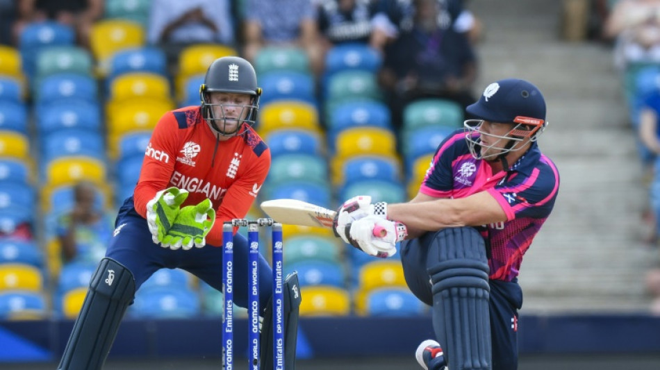 Defending T20 champions England washed out after Scotland scare