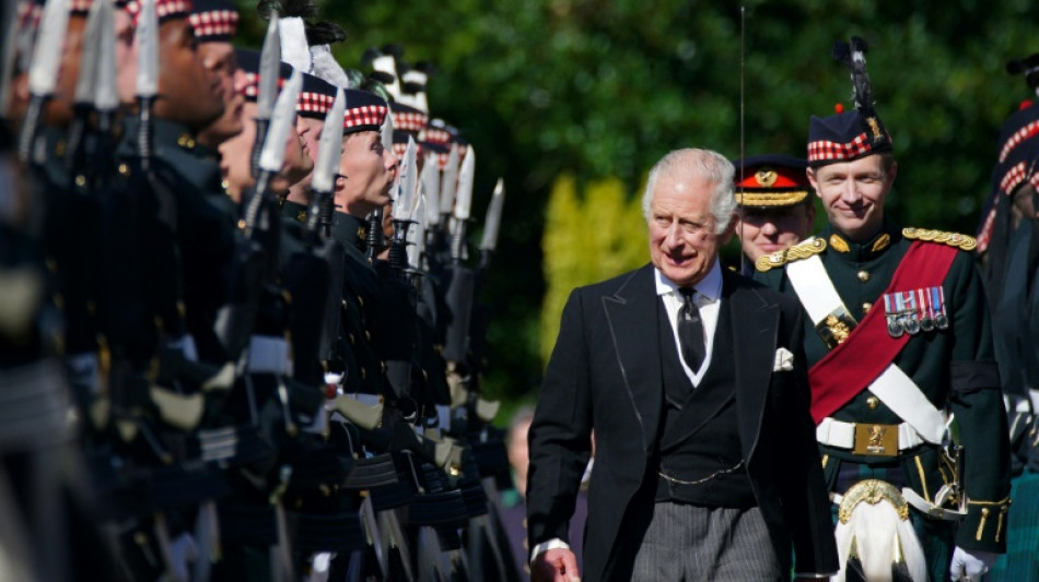 King Charles leads queen's coffin procession in Scotland