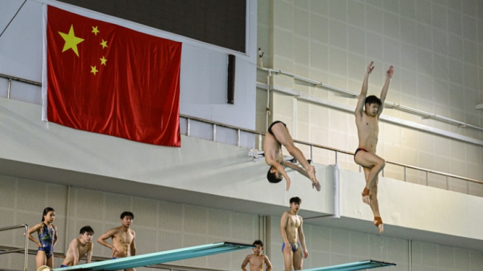 China's Olympic divers inspire next generation at Beijing pool