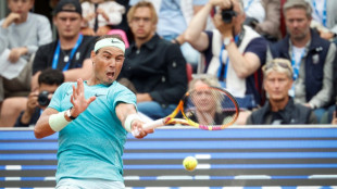 Nadal, Ruud save match point to make doubles semi-finals