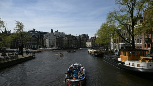 Anger as Amsterdam allows 'ugly' solar panels on historic canal houses