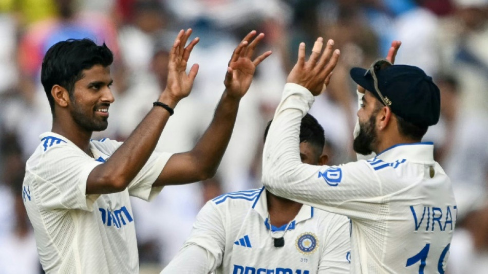 Sundar bags seven as India bowl out New Zealand for 259