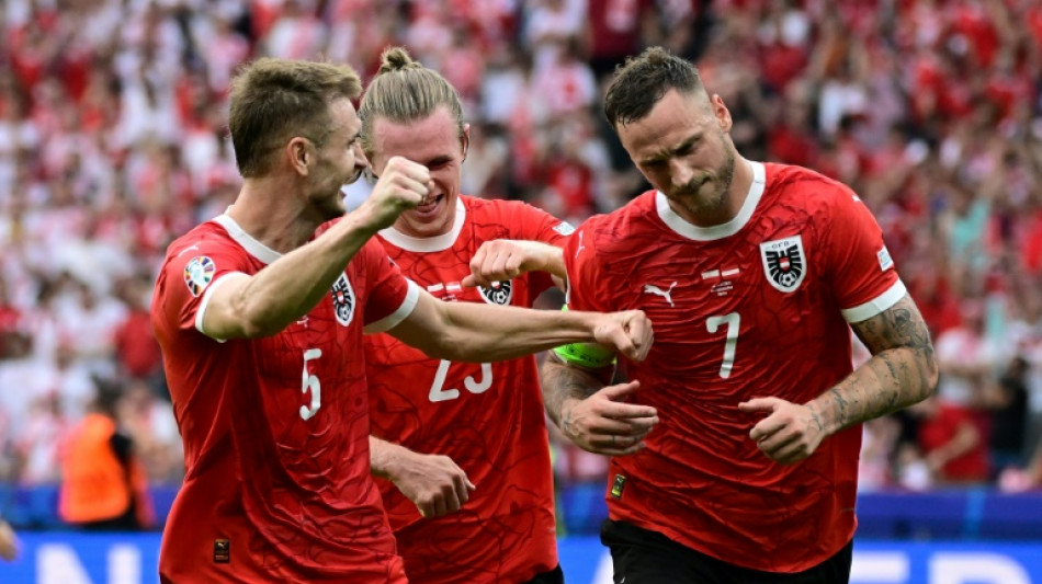 Austria beat Lewandowski's Poland, Ukraine fight back