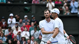 Murray saluted at Wimbledon despite doubles exit as Djokovic wins