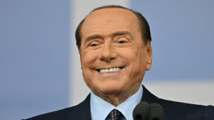 Italy's Berlusconi acquitted in starlet bribery trial