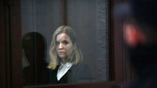 Russian cafe bomb suspect admits partial guilt