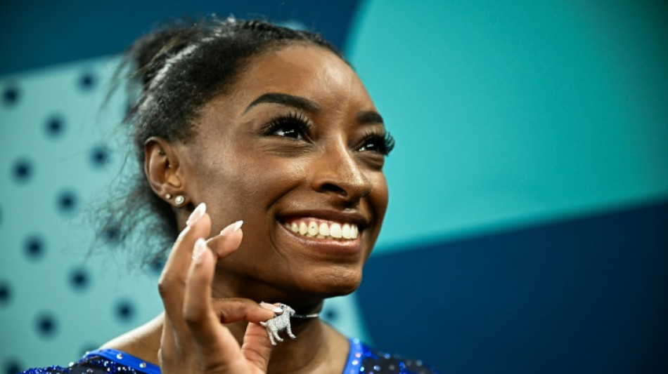 'Just Simone' celebrates GOAT status with Paris all-around gold