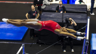 Biles back to 'calm, sometimes goofy' self as Olympic history beckons