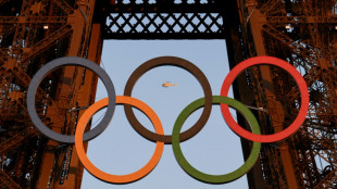 Bach says IOC neutral after Palestinian call for Israel Olympic ban