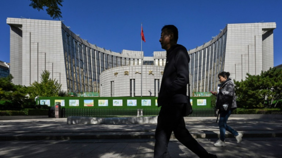 China's central bank cuts two key rates to boost economy