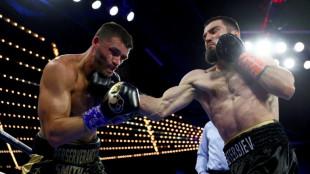 Beterbiev batters Smith to unify light-heavy belts