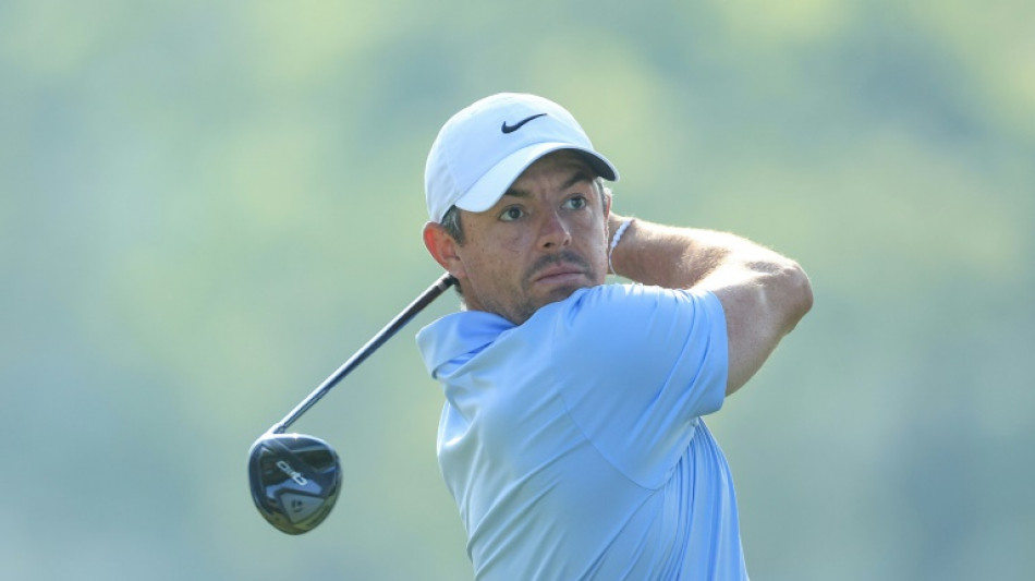 McIlroy passes emotional test to stay in hunt for PGA win